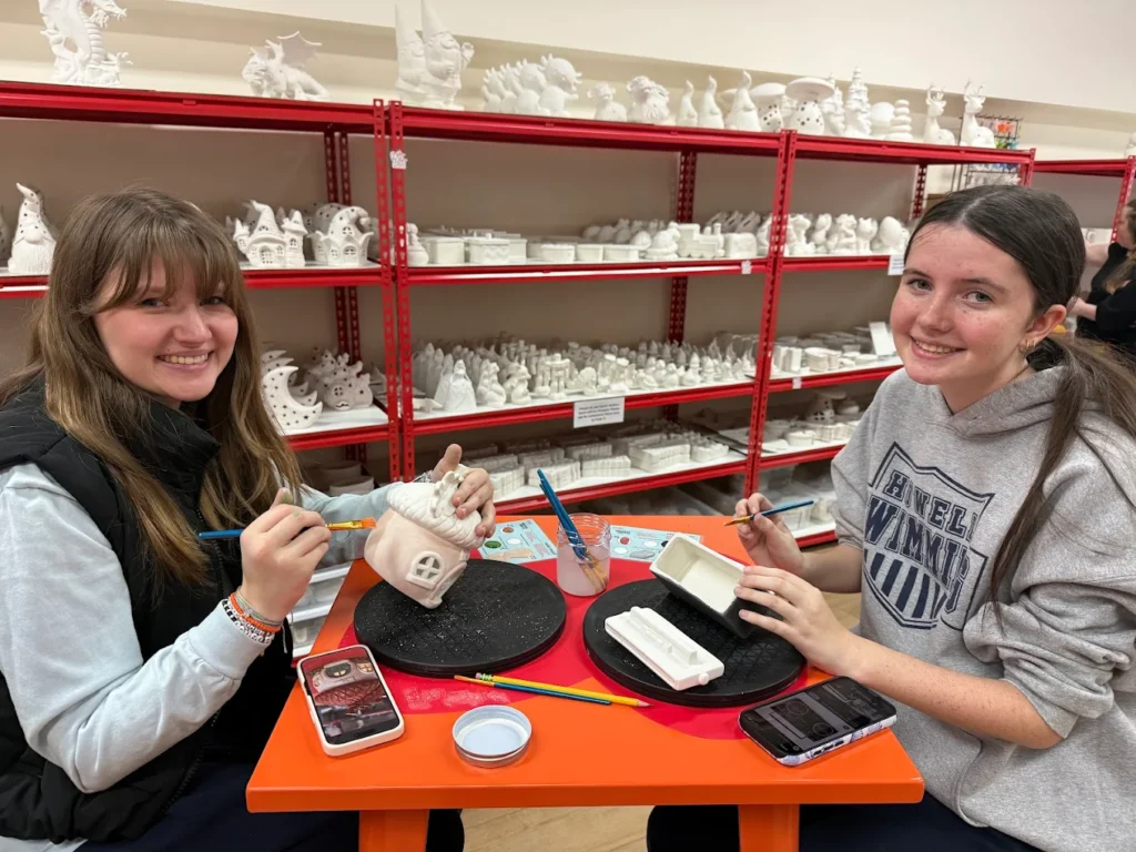Friends paint pottery at The Hot Spot Studios in Howell NJ